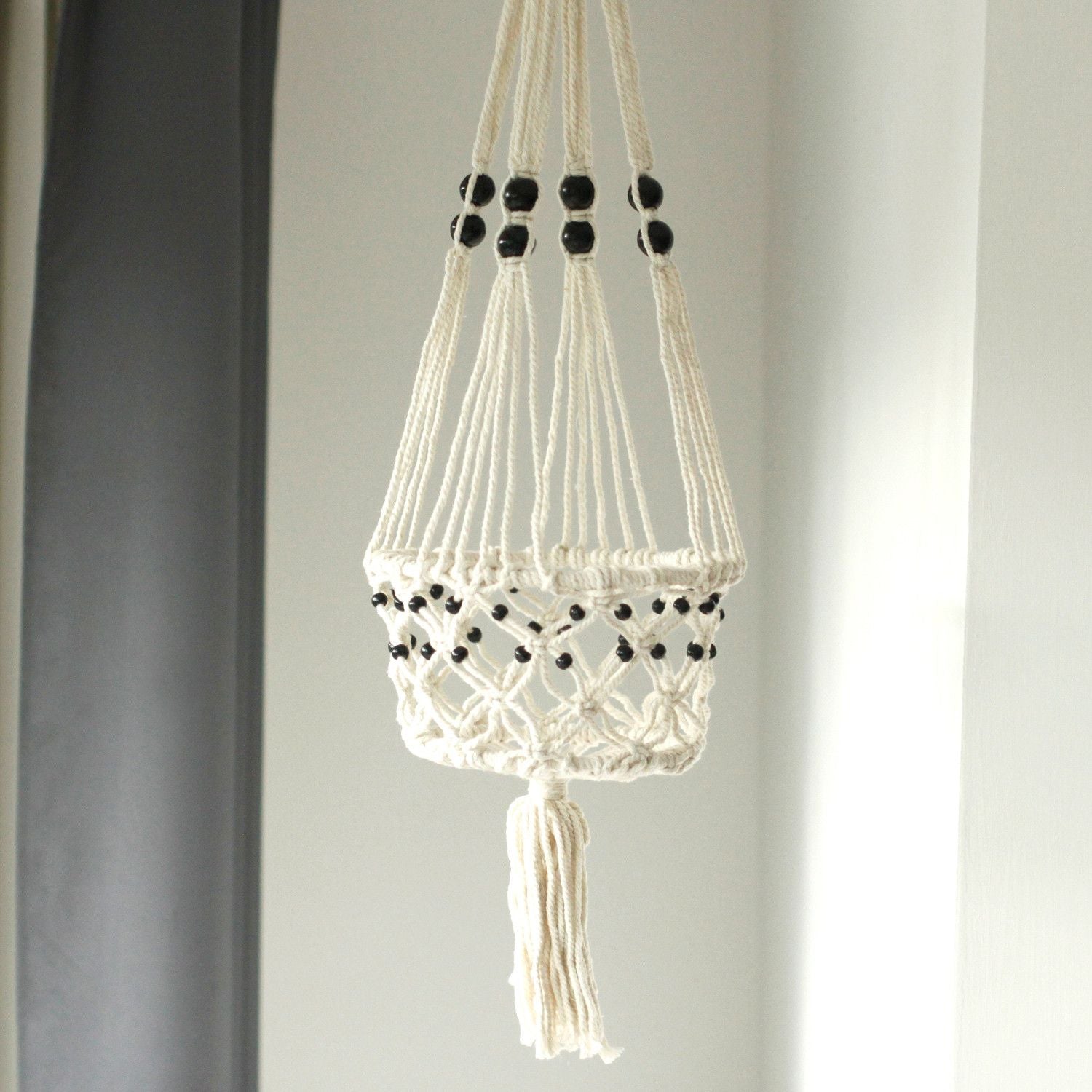 Cotton Macrame Pot Holder – Large Beaded, white cotton hanging planter with black beads and tassel, macrame plant hanger
