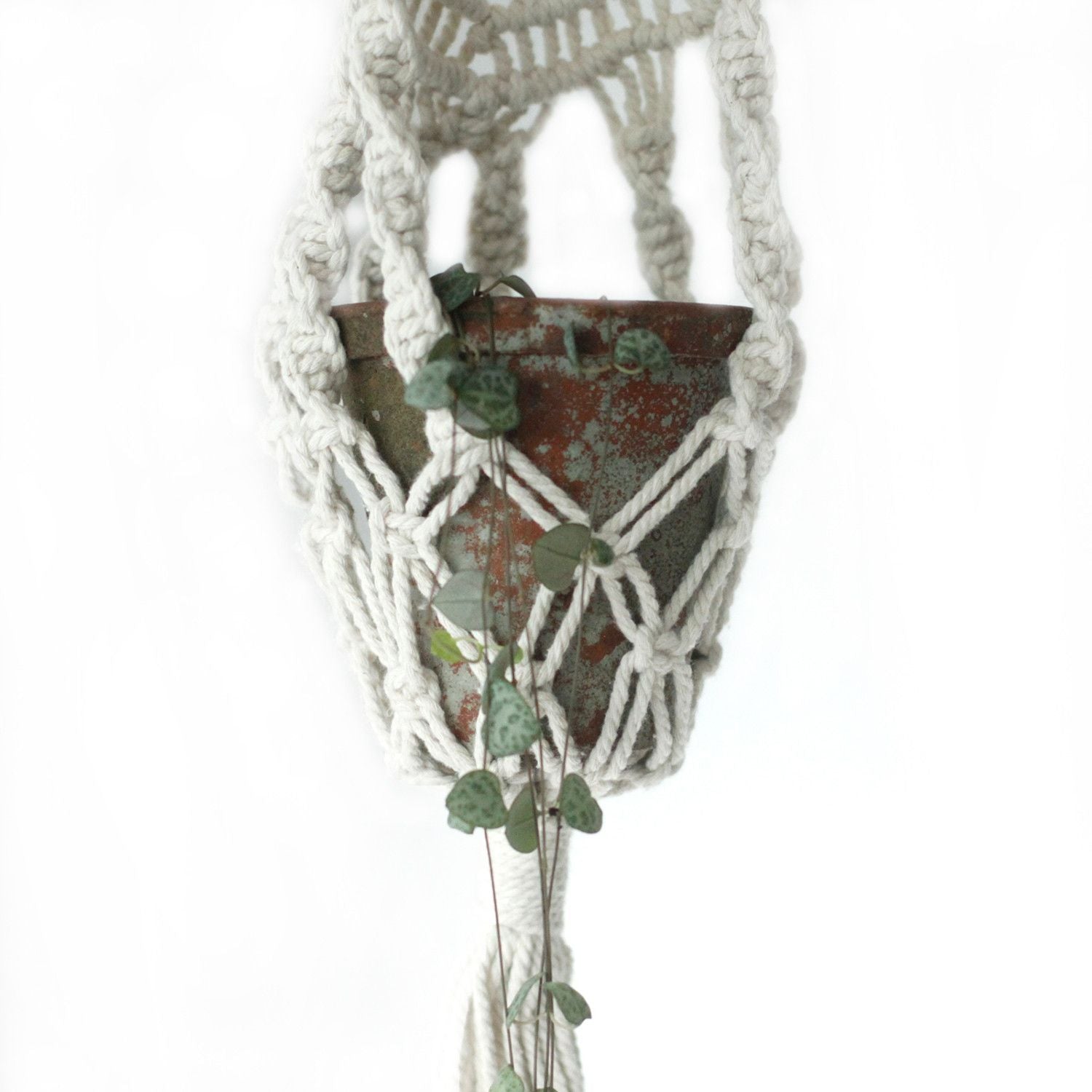 Cotton Macrame Pot Holder – Long Rattan Hoop 100 CM holding a rustic terracotta planter with trailing greenery