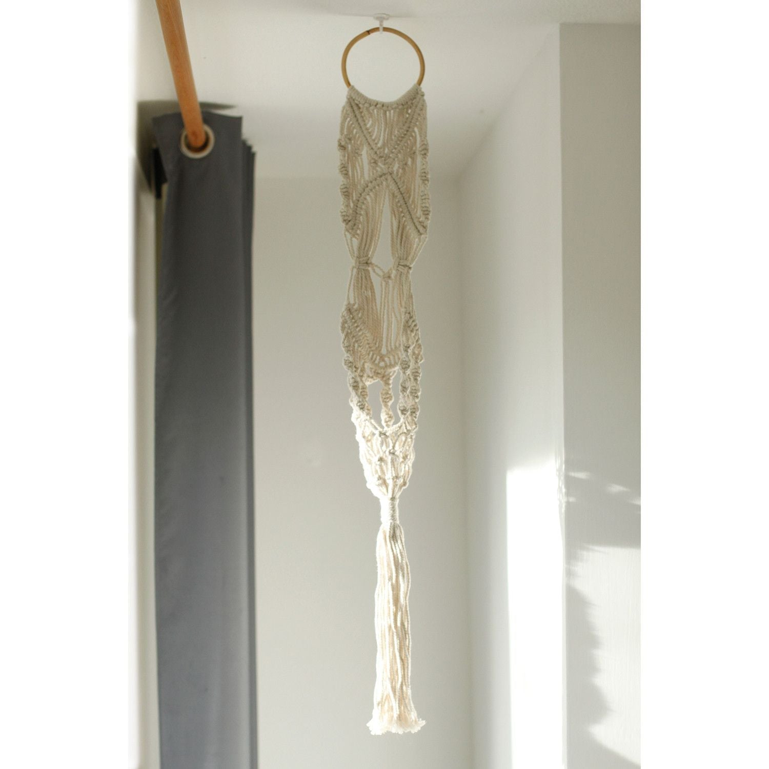 Alt Tag: Cotton Macrame Pot Holder – Long Rattan Hoop 100 CM hanging cotton macrame plant holder with rattan hoop in bright room