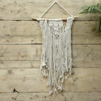 Cotton Macrame Wall Hanging – Wedding Blessing, white cotton macrame wall decor with fringe tassels hanging on wooden plank wall