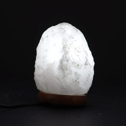 Alt Tag: Crystal Rock Himalayan Salt Lamp – Approx. 1.5–2 KG white crystal rock salt lamp on wooden base, soft ambient glow