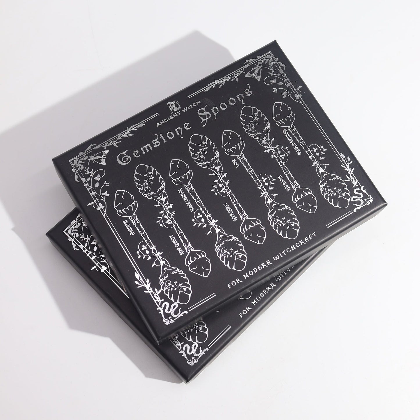 Alt Tag: Dark Silver Gemstone Witch Spoons – Set of 7 boxed set, black packaging with gemstone spoon illustration and floral border