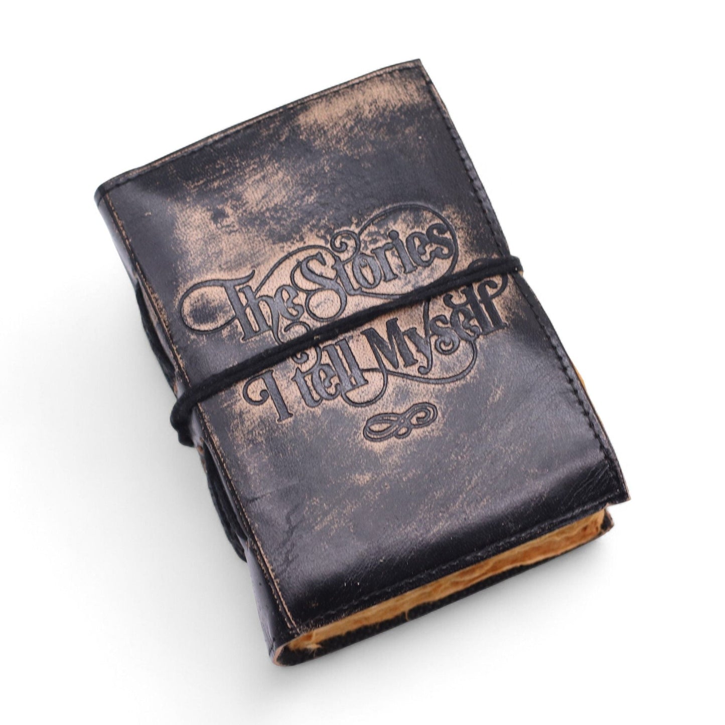 Deckled Edge Leather Notebook – 9x13 CM - The Stories I Tell Myself, cuero marrón con páginas de borde irregular y cierre con cordón
