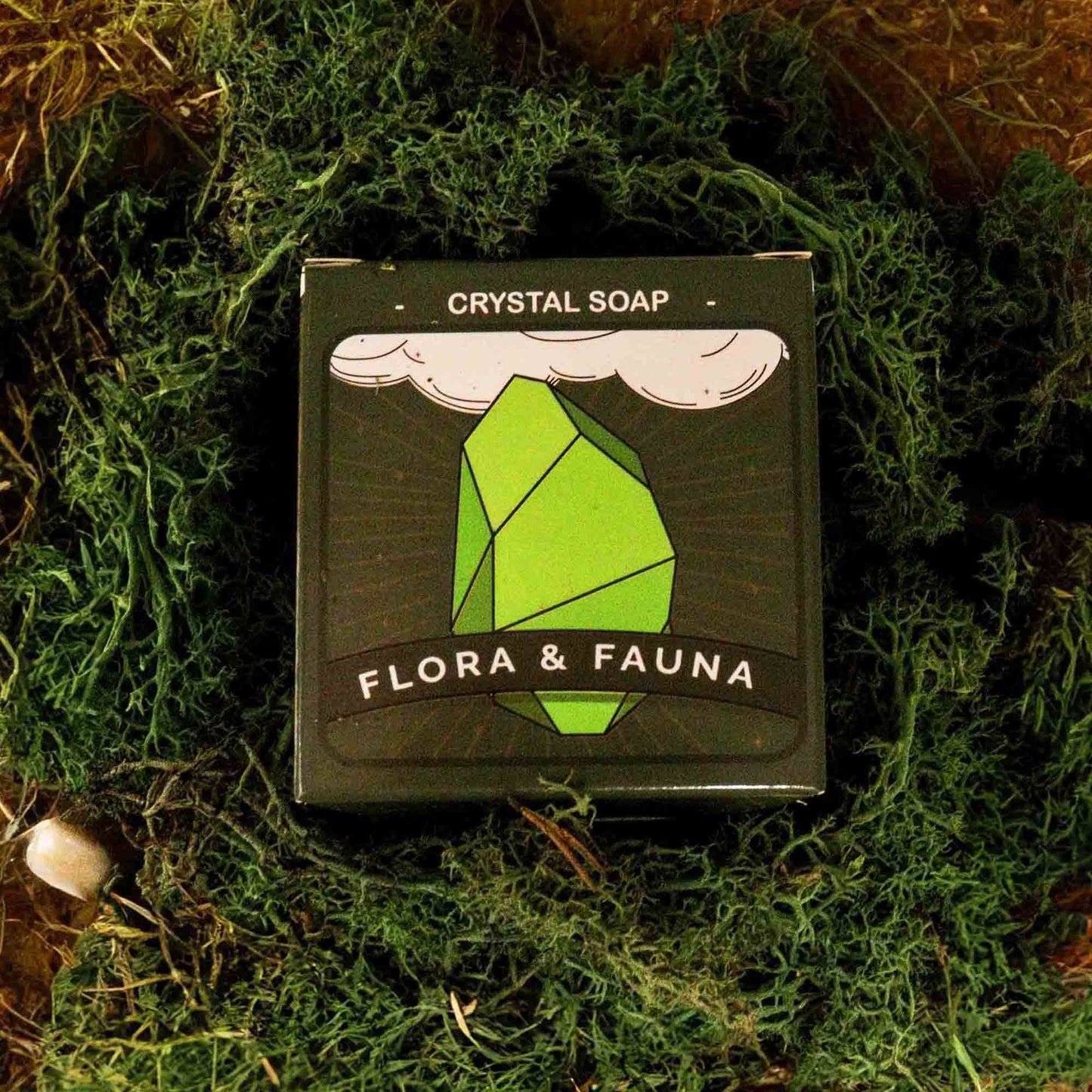 Alt Tag: Earth Crystal Elemental Soap – 100G crystal soap box with green crystal illustration on moss background