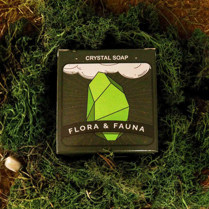 Alt Tag: Earth Crystal Elemental Soap – 100G crystal soap box with green crystal illustration on moss background