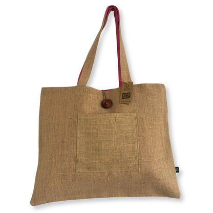 Eco-Chic Reversible Jute & Cotton Bag – Pink, tote bag with jute exterior, cotton lining, pink handles, front pocket and button closure