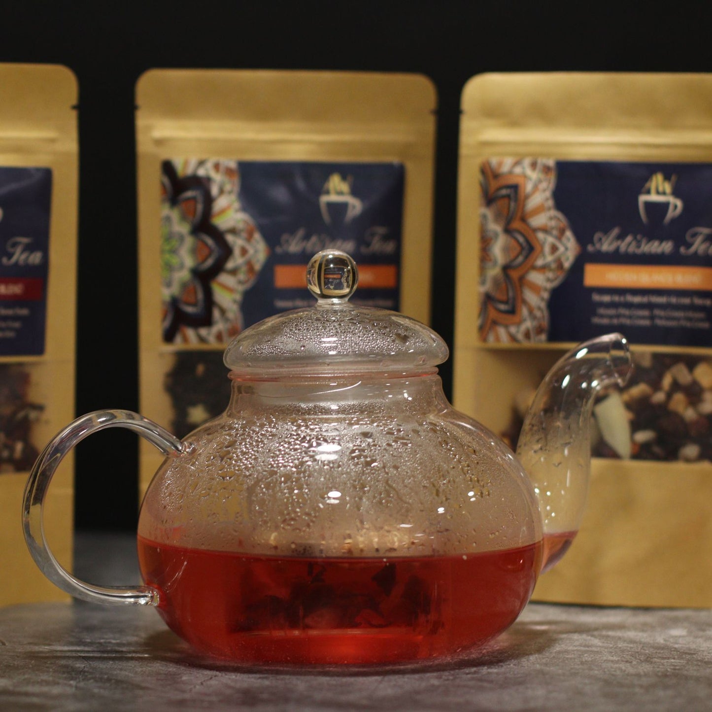 Elegant Glass Infuser Teapot – Round Pearl 400ML with round pearl lid, clear glass teapot brewing loose leaf tea on countertop