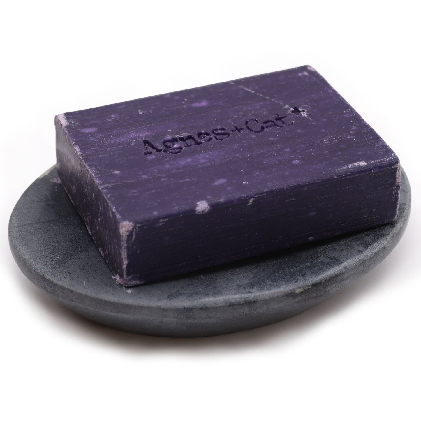 Alt Tag: Elegant Grey Soapstone Dish – 10x12CM Oval, handcrafted oval grey soapstone dish holding a purple bar soap