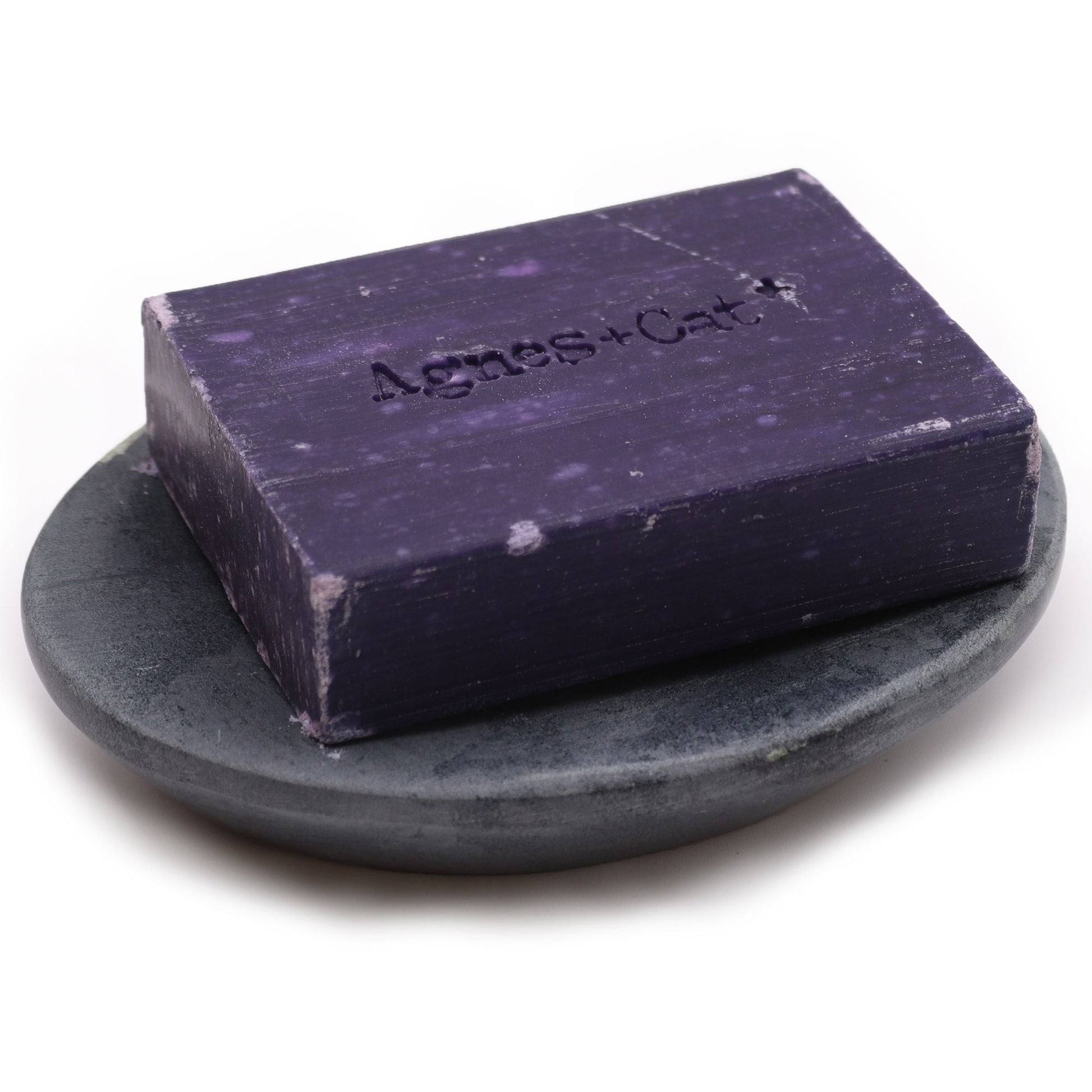 Alt Tag: Elegant Grey Soapstone Dish – 10x12CM Oval, handcrafted oval grey soapstone dish holding a purple bar soap