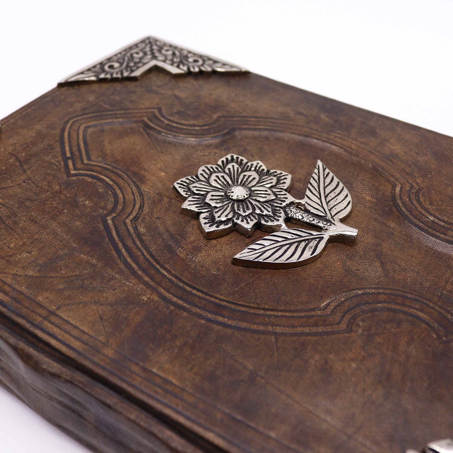 Elegant Zinc Rose Leather Journal – 26x18CM, 200 Pages with embossed leather cover and zinc rose floral emblem close-up