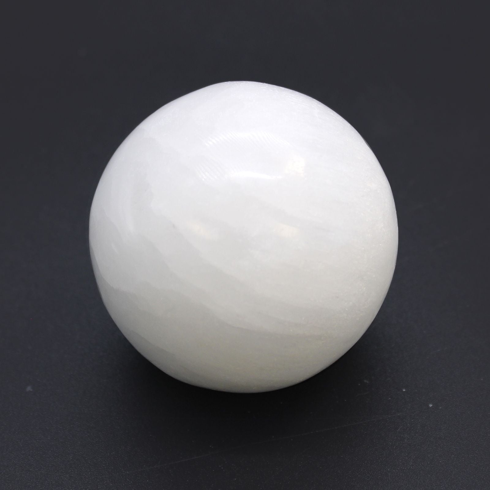 Alt Tag: Enchanting Selenite Sphere – 5 to 6 CM, natural white selenite crystal sphere 5.5 cm polished, for décor and meditation