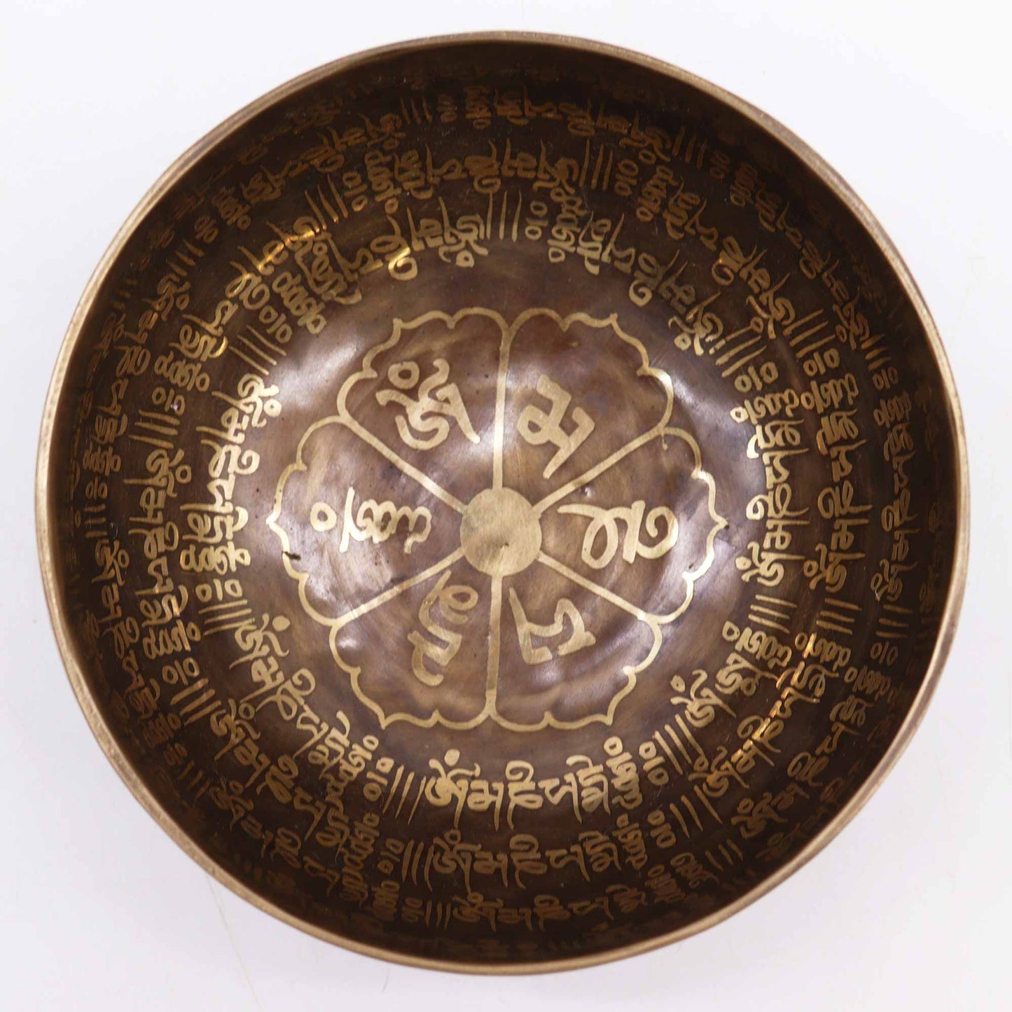 Alt Tag: Engraved Mantra Singing Bowl – 16CM with Tibetan mantra engravings inside, bronze metal meditation bowl close-up