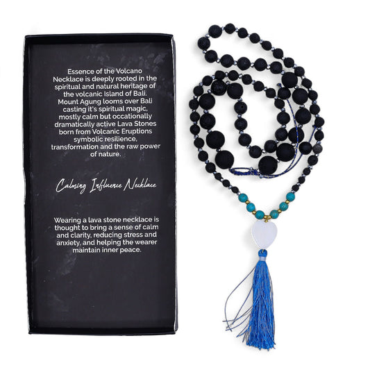 Essence of the Volcano Necklace – Calming Influence lava stone bead necklace with blue tassel and product box