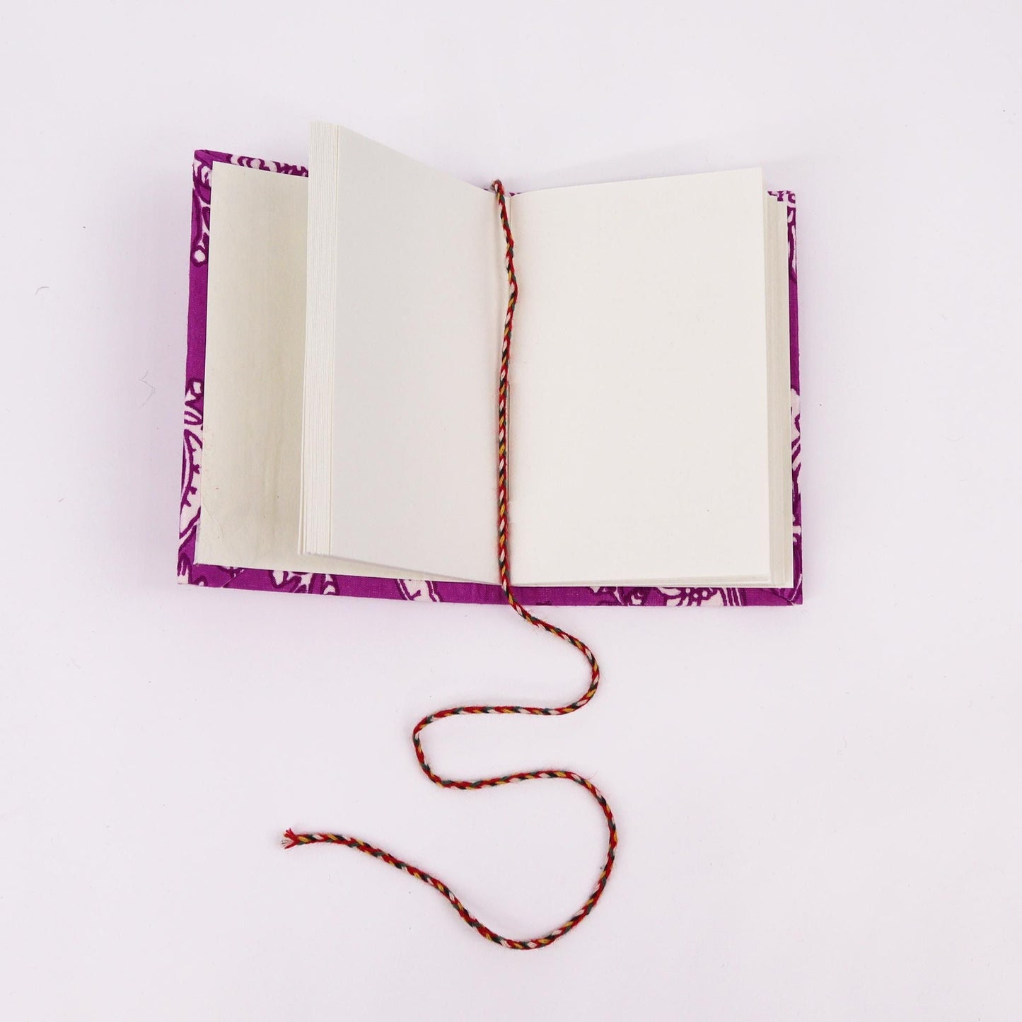Floral Cotton Notebooks – 7x10CM Assorted Set open notebook with blank recycled handmade paper pages and braided bookmark