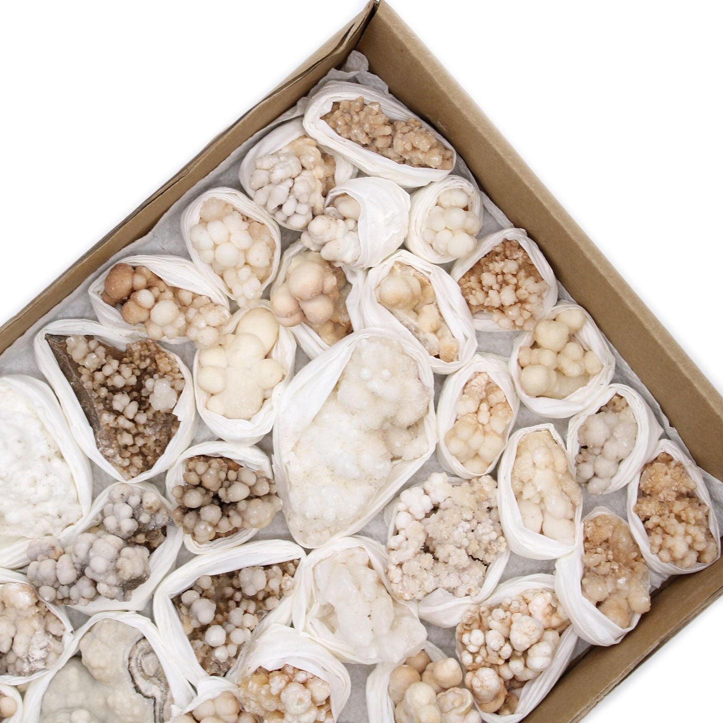 Alt Tag: Flower Calcite Specimens – 20-Piece Collection, assorted flower-like calcite mineral clusters packed in protective wraps in a box