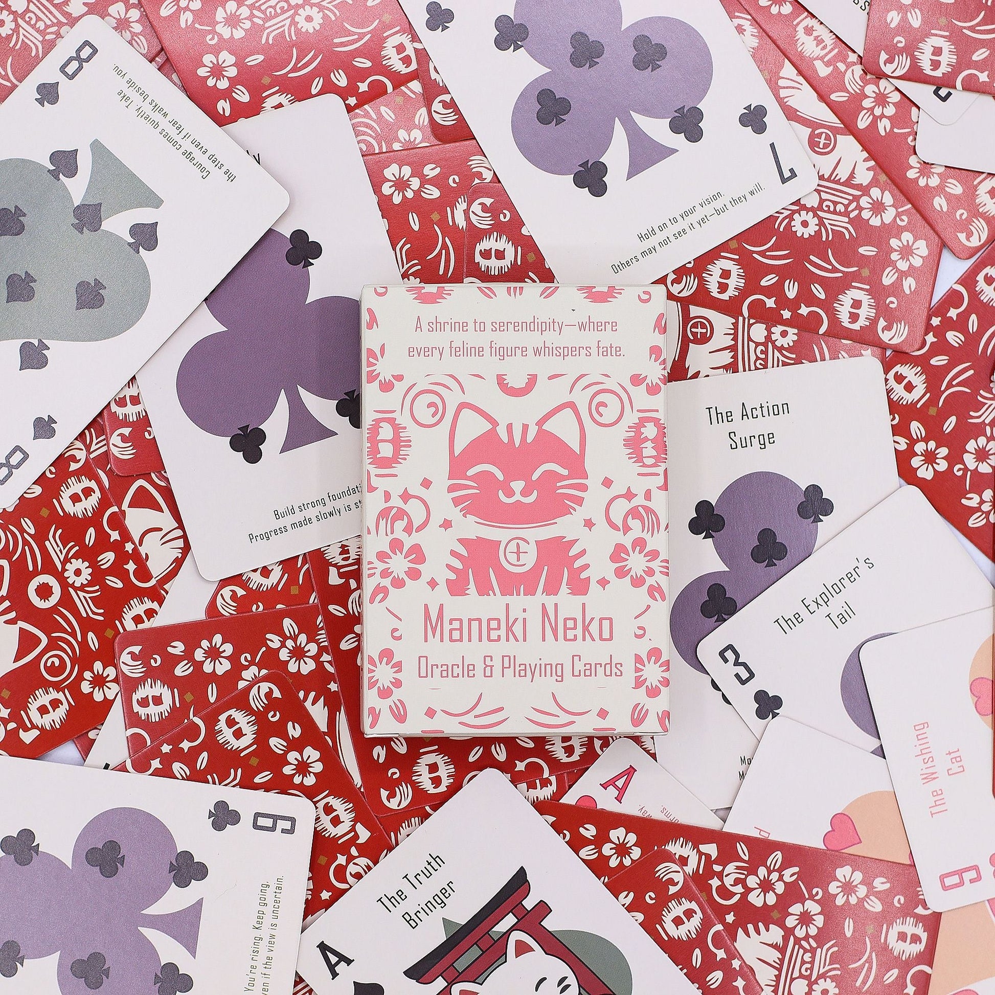 Fortune Cats Playing & Oracle Cards – Maneki Neko Deck with illustrated Maneki Neko box and playing-style oracle cards on red patterned background