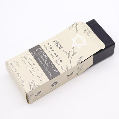 Alt Tag: Fuller’s Earth Clay Soap – Bergamot & Sandalwood bar soap in kraft sleeve packaging, activated charcoal, shea butter, cranberry seeds