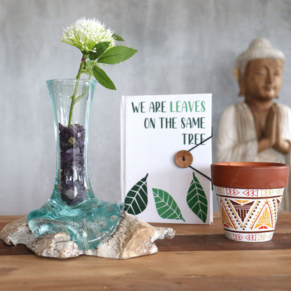 Gamal Wood Molten Glass Vase – Small with hand-blown recycled glass on Gamal wood base, holding flower on tabletop decor