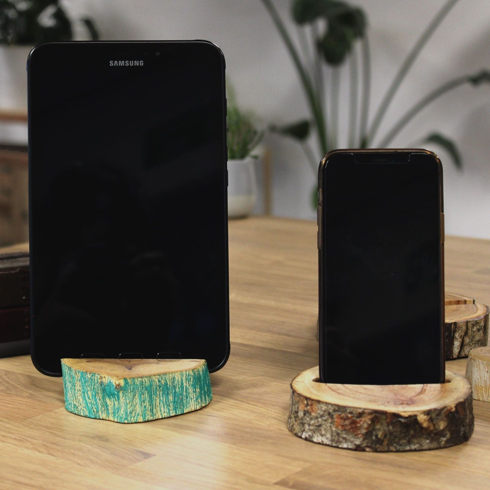 Gamal Wood Phone Holder – Large Greenwash, wooden smartphone stand with greenwash finish on desk, holding phone upright