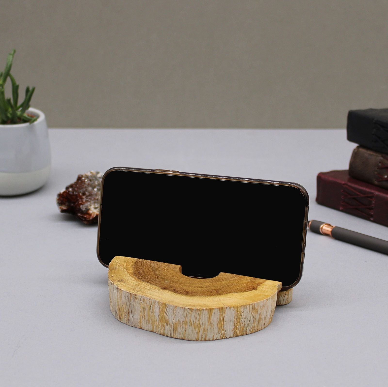 Alt Tag: Gamal Wood Phone Holder – Large Whitewash holding smartphone on desk, whitewashed wooden stand with curved groove