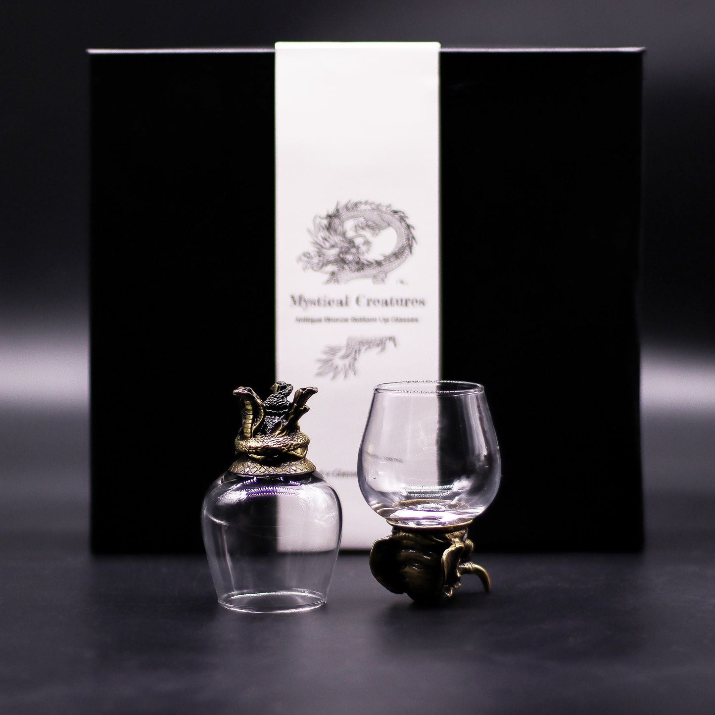 Alt Tag: Gift Set of 6 Glasses (100 ML) – Mystical Creatures – Antique Bronze with glass cups and antique bronze-style mythical holders