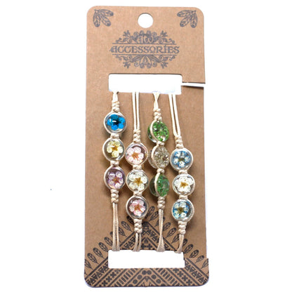 Alt Tag: Glass & Floral Bracelet – Tri-Flower Design bracelet with real flowers encased in glass beads, multicolor floral jewelry on display card