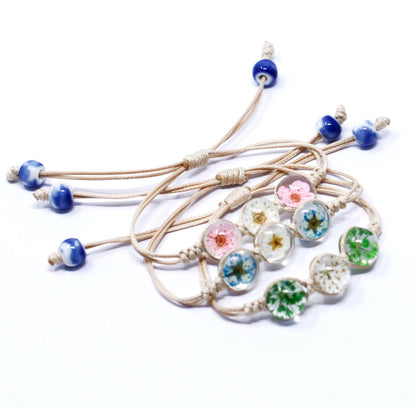 Alt Tag: Glass & Floral Bracelet – Tri-Flower Design with adjustable beige cord and glass beads featuring real flower details