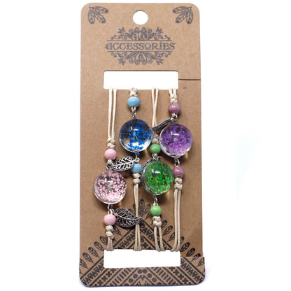 Alt Tag: Glass Pressed Flowers Bracelet – 10x1.5x1 CM con dijes de vidrio con flores prensadas y cuentas de colores, en empaque