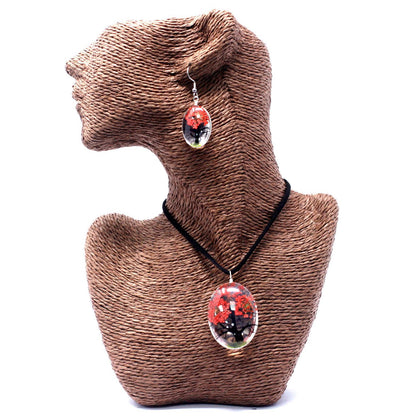 Glass Pressed Flowers Jewellery – Tree of Life Coral necklace and matching drop earrings on display bust