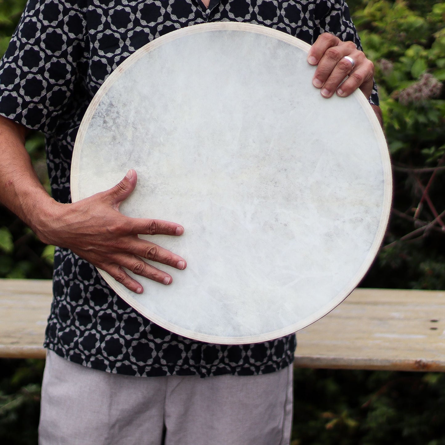 Goatskin Ocean Drum – 45CM Sound Harmonizer held by person, large round frame drum with natural goatskin head outdoors