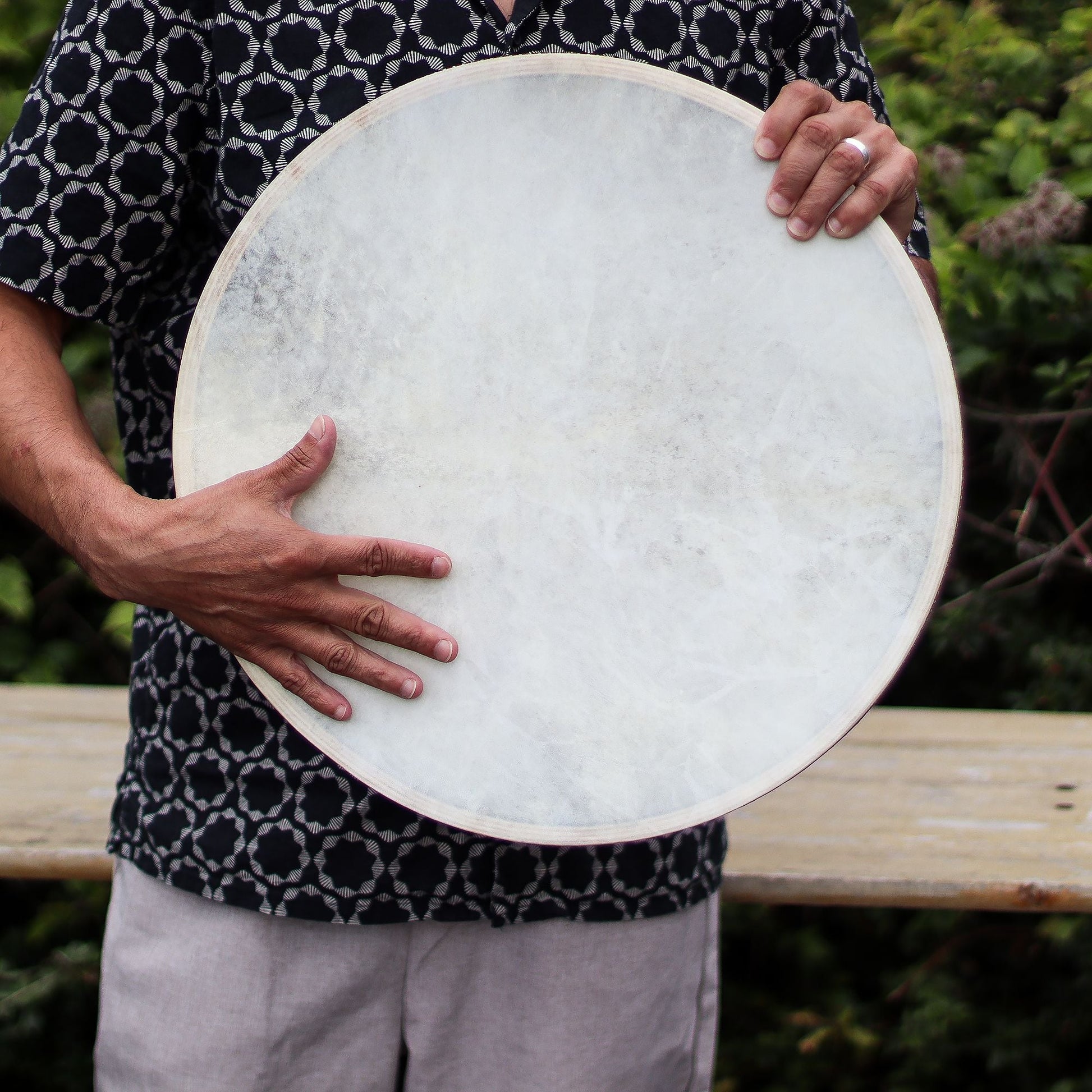 Goatskin Ocean Drum – 45CM Sound Harmonizer held by person, large round frame drum with natural goatskin head outdoors