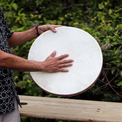 Goatskin Ocean Drum – 45CM Sound Harmonizer held in hands, round goatskin frame drum outdoors