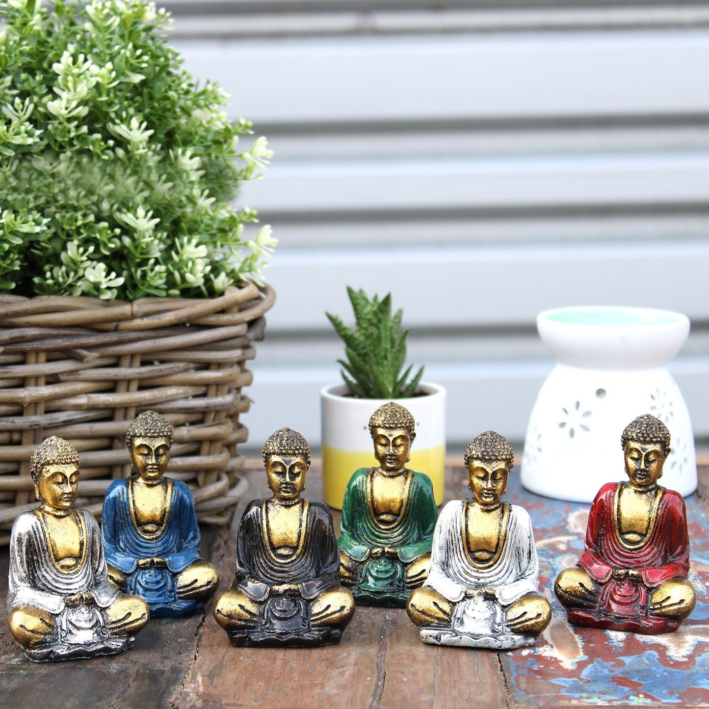 Gold Resin Mini Buddha – Assorted Colours – 8x6x4 CM set of hand-painted mini Buddha figurines in assorted colours on tabletop decor