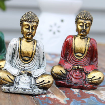 Alt Tag: Gold Resin Mini Buddha – Assorted Colours – 8x6x4 CM, hand-painted mini Buddha figurines in red and white decor