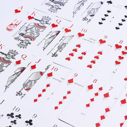 Alt Tag: Gothic Memento Mori Cards – 9x2x6 CM deck with black-and-red playing cards laid out, gothic-style illustrated court cards
