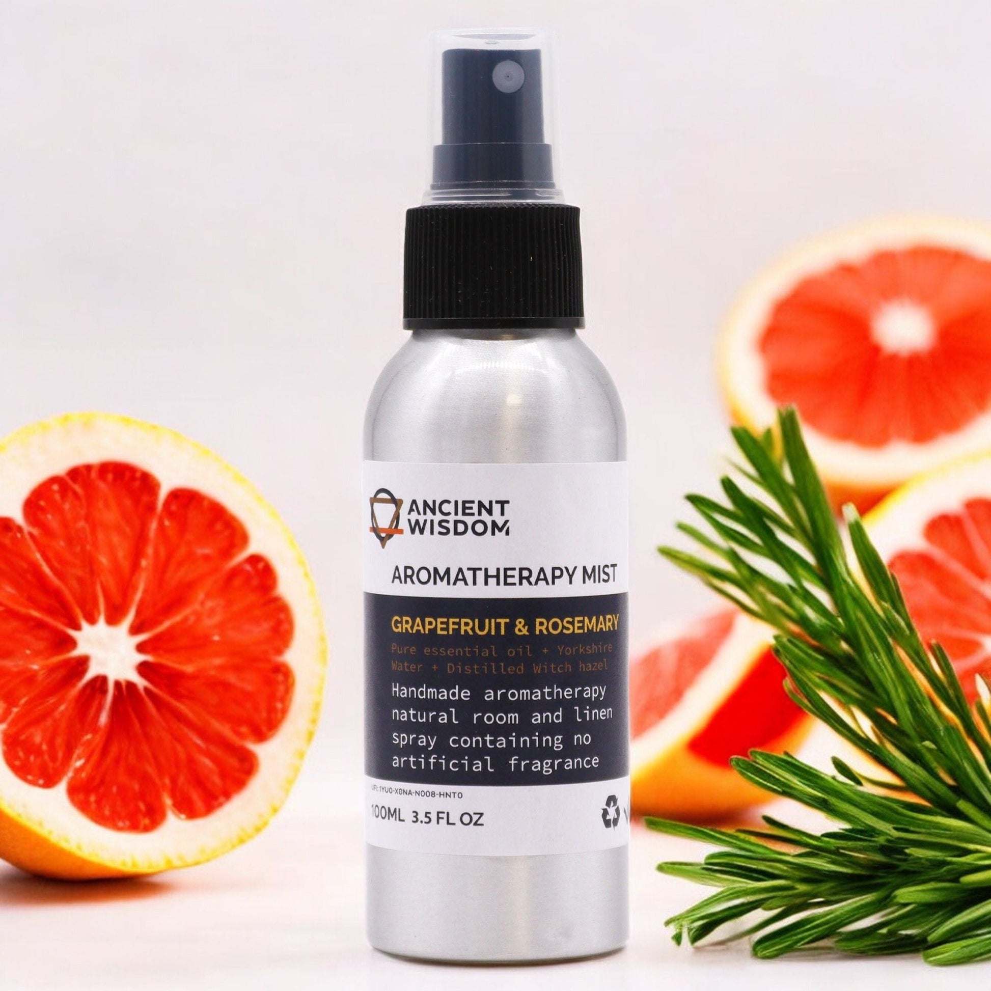 Alt Tag: Grapefruit & Rosemary Essential Oil Mist – 100ML spray bottle with grapefruit slices and rosemary sprigs