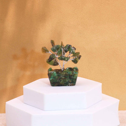 Alt Tag: Green Aventurine Mini Gemstone Tree – 15 Stones with orgonite base on white pedestal, green gemstone leaves decor