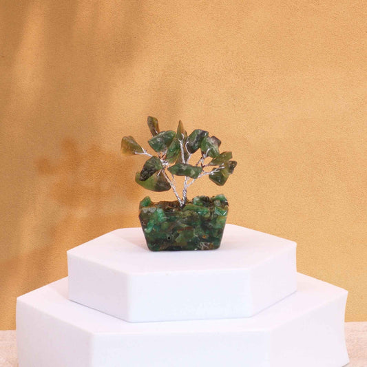 Alt Tag: Green Aventurine Mini Gemstone Tree – 15 Stones with orgonite base on white pedestal, green gemstone leaves decor