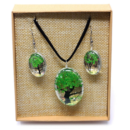 Alt Tag: Glass & Flower Tree of Life Jewellery – Green set with glass pendant necklace and matching earrings featuring green pressed flowers