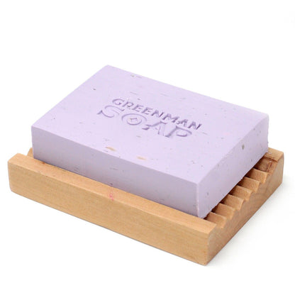 Alt Tag: Lavender & Geranium Night Soap – 100G bar on wooden soap dish, Greenman Soap embossed, lavender-colored botanical soap