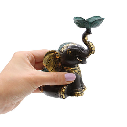 Brass Elephant Candle Holder – 11x6.5x11 CM, handcrafted brass elephant holder held in hand, side view on white background