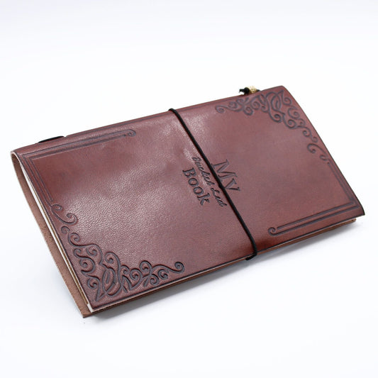 Alt Tag: Handcrafted Leather Journal – Brown 80 Pages, genuine leather notebook with embossed cover and elastic closure, 80 blank pages
