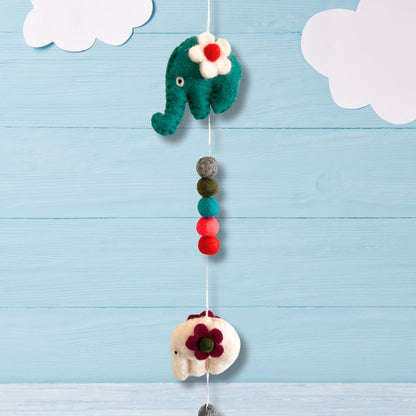 Alt Tag: Handcrafted Felt Elephant Wall Hanging – 110 CM, handmade Nepalese felt elephant decor with colorful pom-poms and flower accents