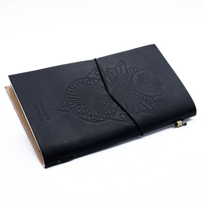 Alt Tag: Handcrafted Leather Journal – My Book of Spells, Black, black leather journal with embossed design and wrap cord closure