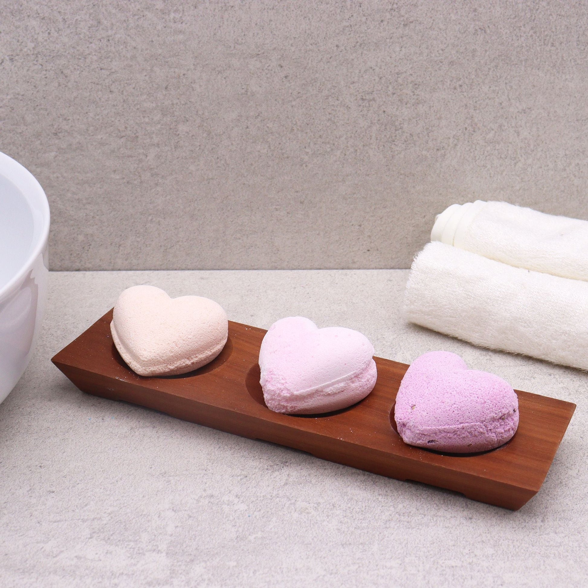 Handcrafted Mahogany Soap Dish – Three-Bay Design with three heart-shaped soaps on wooden tray in bathroom setting