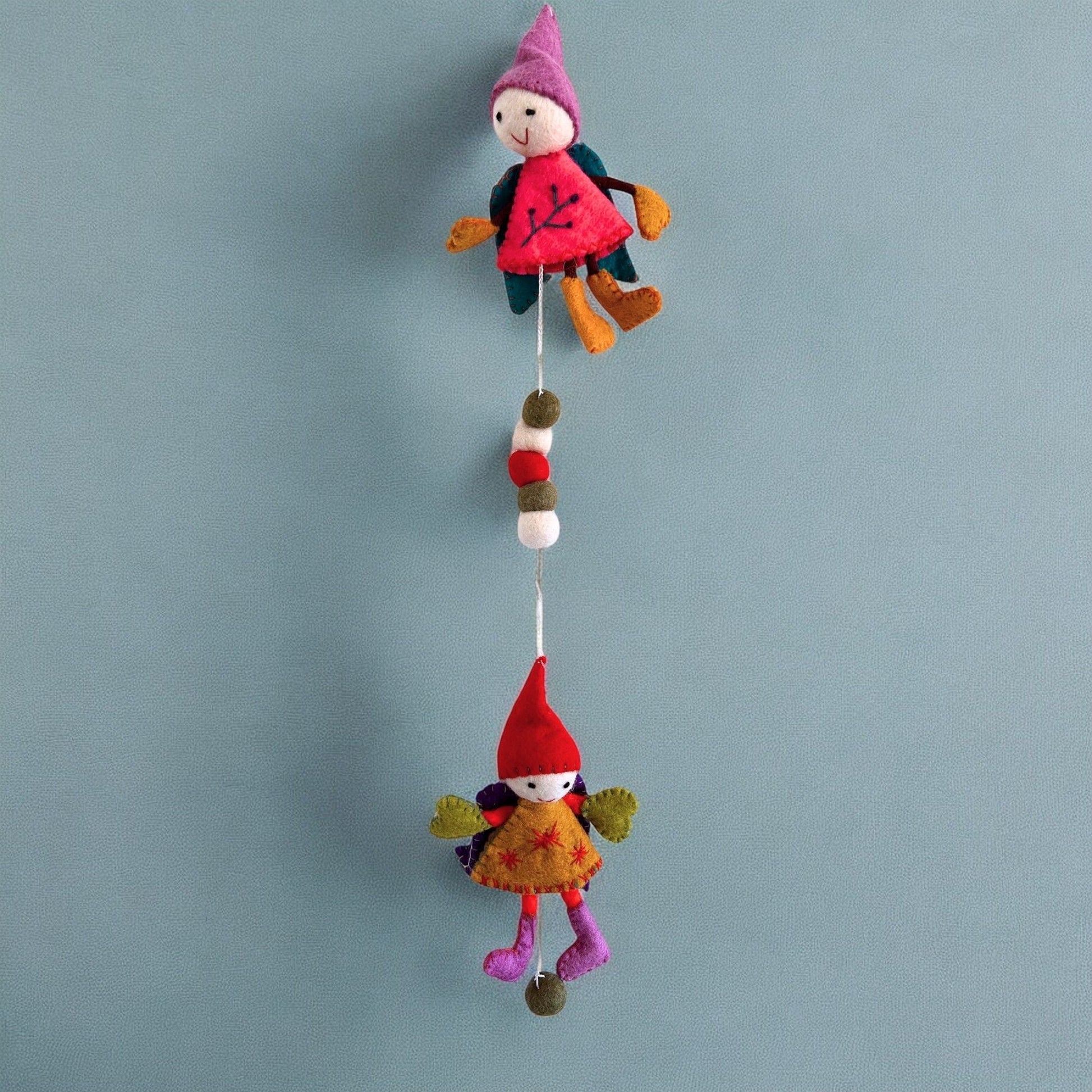 Alt Tag: Handmade Felt Fairy Angels – 110 CM Wall Hanging with pastel felt fairy angels hanging on string, handmade Nepal decor