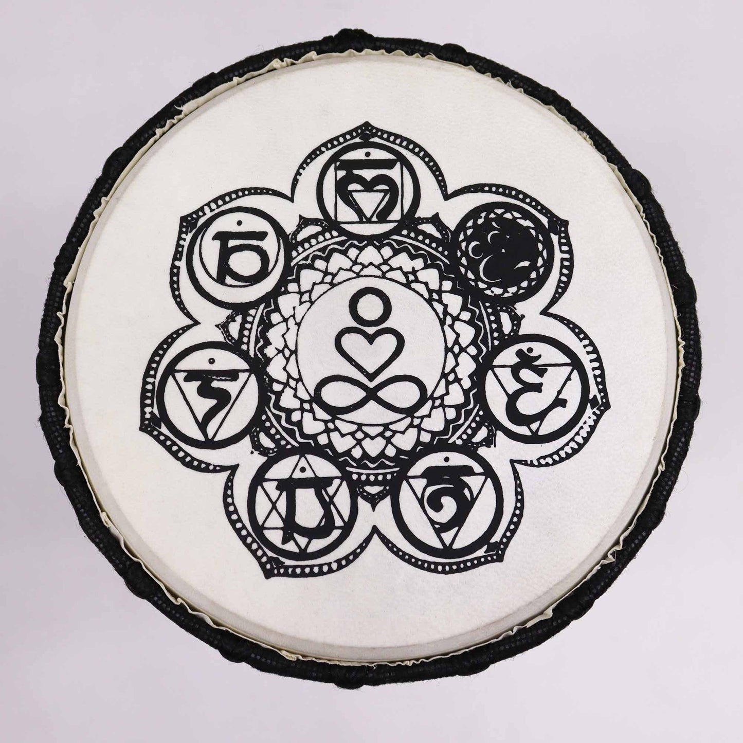 Alt Tag: Handmade Wide Top Djembe Drum – 30 CM wide top drum head with black mandala-style symbol design on white skin