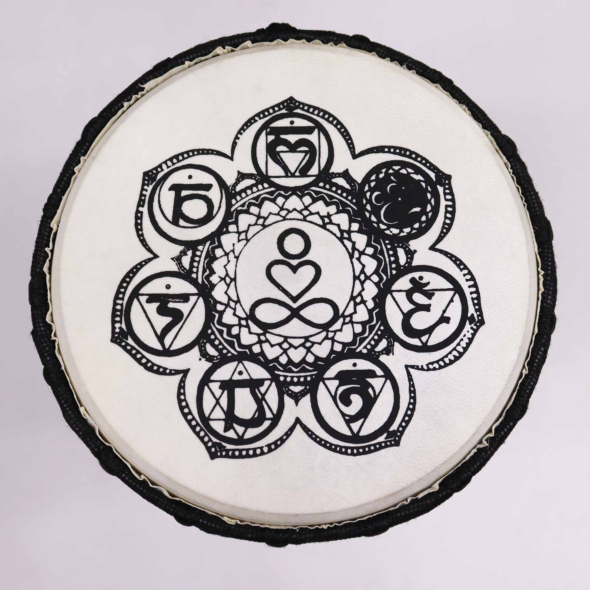 Alt Tag: Handmade Wide Top Djembe Drum – 30 CM wide top drum head with black mandala-style symbol design on white skin