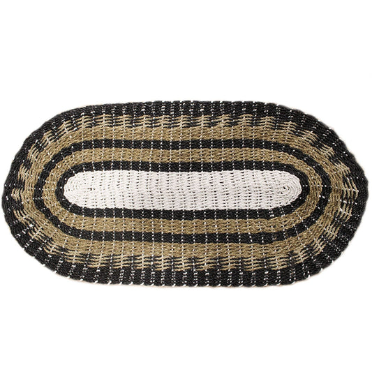 Alt Tag: Handwoven Seagrass Rug – Black & White Classic 60x120 CM oval braided seagrass rug in black, white and tan on white background