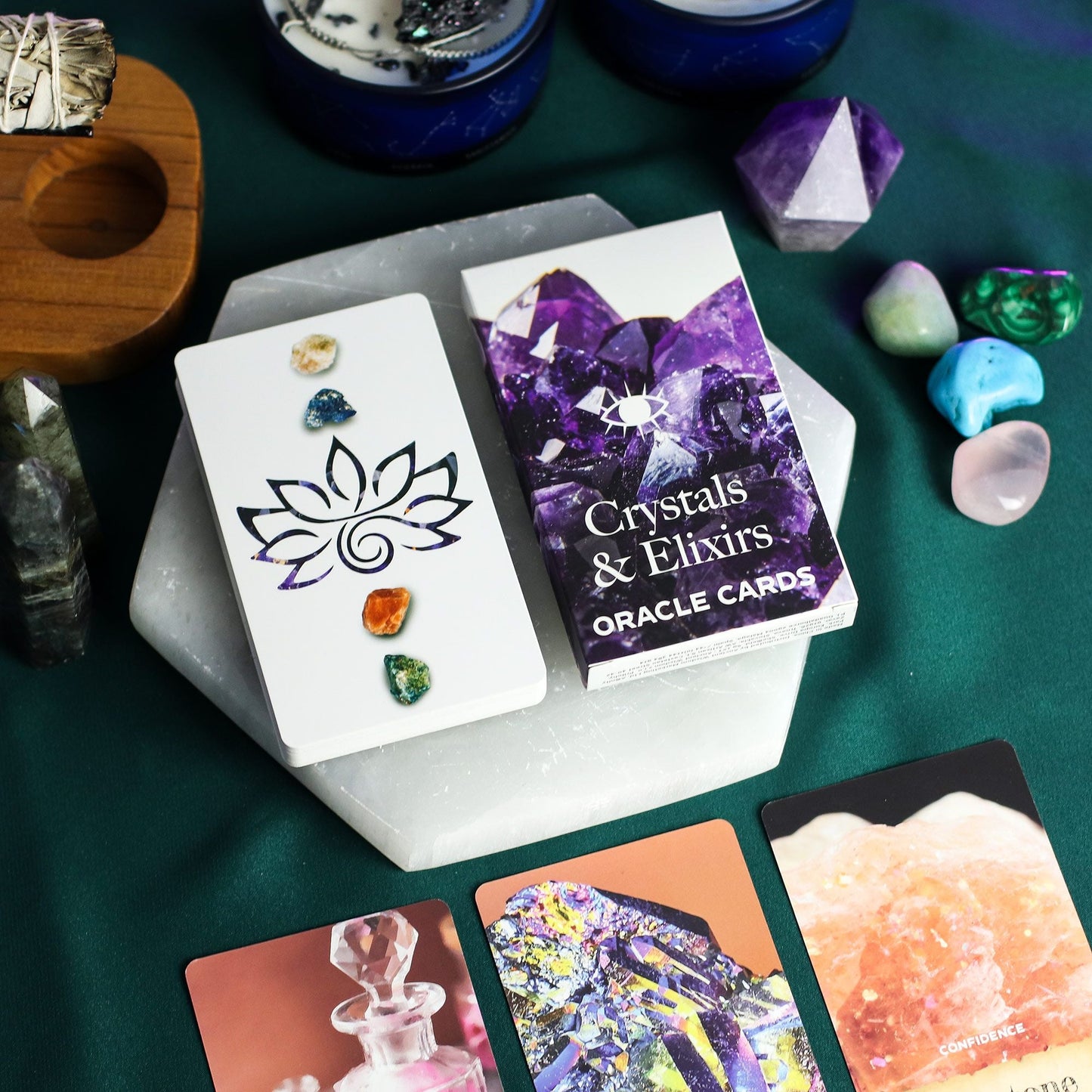 Alt Tag: Harmonizing Energy Oracle Cards – Insightful Deck oracle card deck with crystals, amethyst cover, and colorful card spreads on table